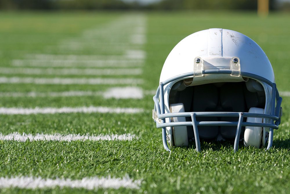 football helmet on a field.