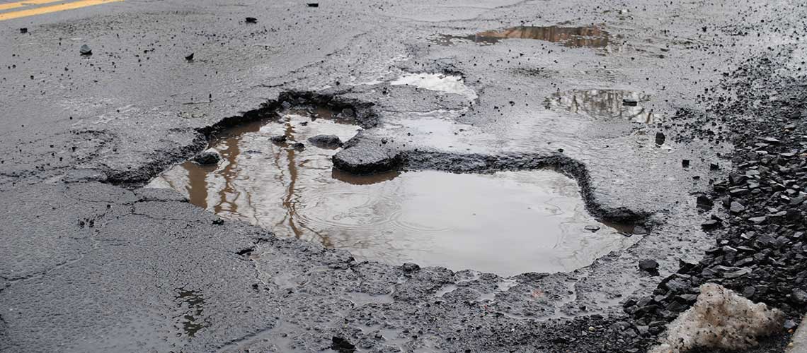large pothole in road